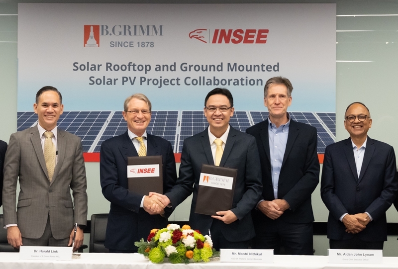 MOU signing between B.Grimm Power and Siam City Cement for a 102 MW solar project.
